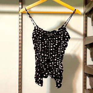 Cute Ruched black with white Polk a dots tank top.